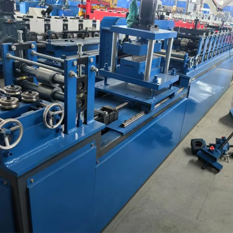 Mesin Roll Forming Track Listrik
